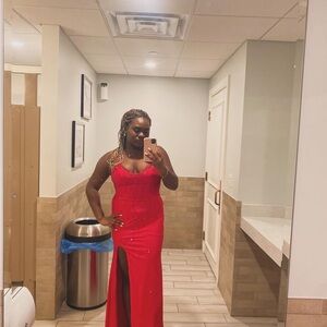 Red prom dress with purple rhinestones. Like new, worn only once great condition